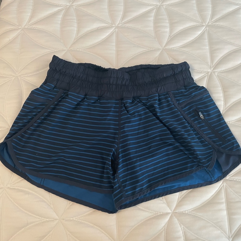 Lululemon women’s shorts, size 12, navy with lighter blue stripes
